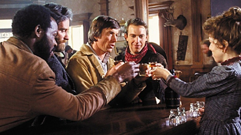 The boys of Silverado share a drink.