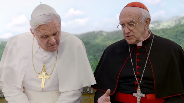 Two old men chit-chat, they happen to be Popes.