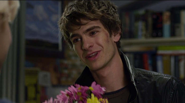 Peter Parker gives Gwen Stacy flowers