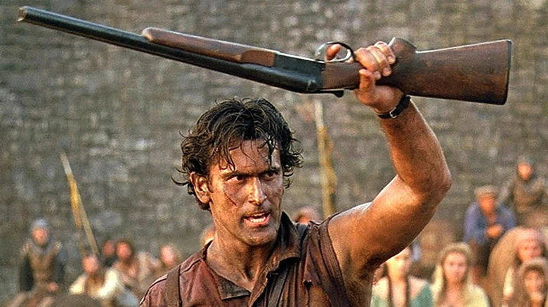 Ash Williams holding shotgun Army of Darkness