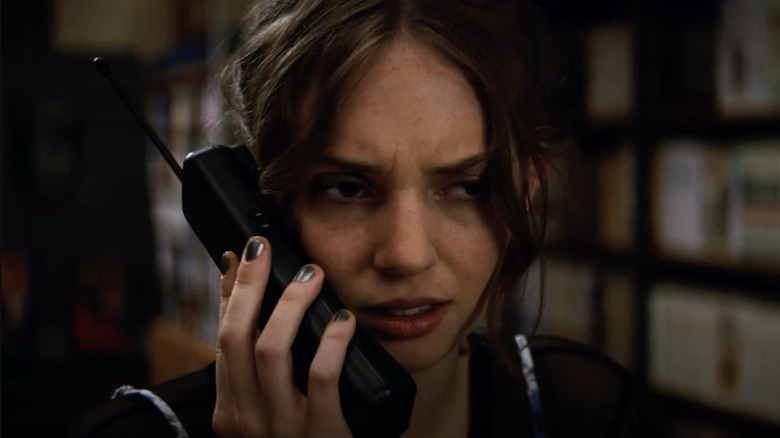 Maya Hawke as Heather on the phone in Fear Street Part One: 1994