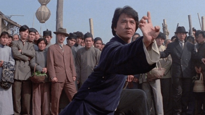 Jackie Chan preparing for a fight