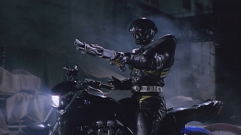 Jiro Okamoto in Hakaider armor astride his motorcycle