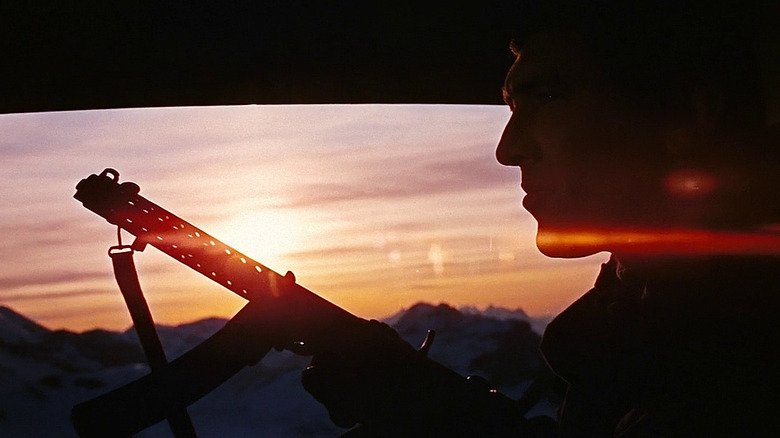 George Lazenby flying past the sunrise