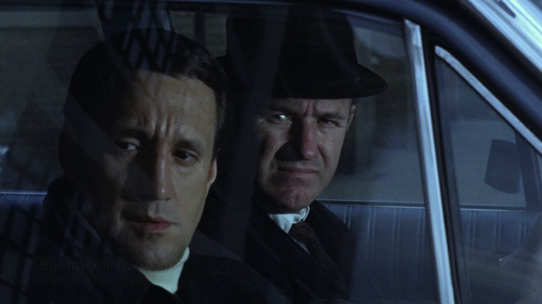 Roy Scheider and Gene Hackman staked out in a car