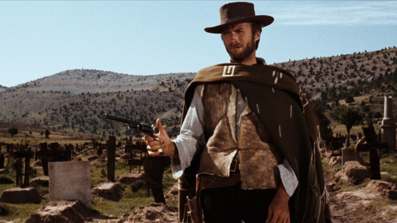 Clint Eastwood holding a six-shooter