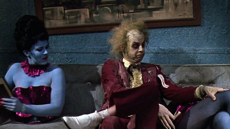Beetlejuice touching bisected woman's legs