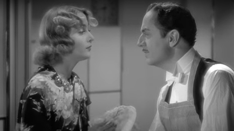 Carole Lombard and William Powell washing dishes