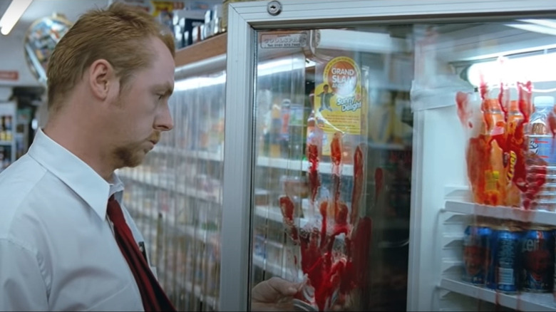 Simon Pegg in blood-stained convenience store