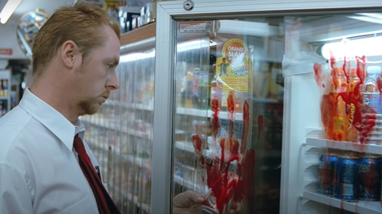 Simon Pegg in blood-stained convenience store