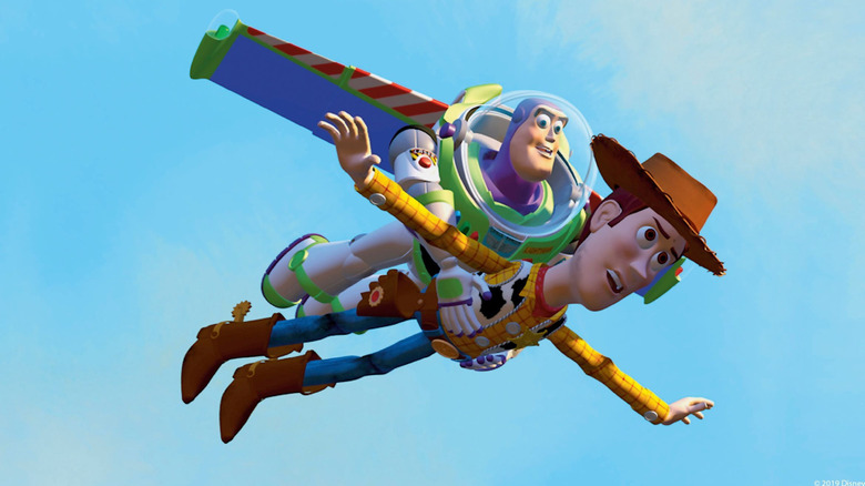 Buzz Lightyear flying and carrying Woody in Toy Story