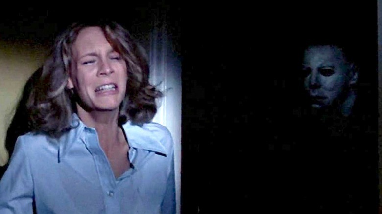 Laurie Strode hides from Michael Myers