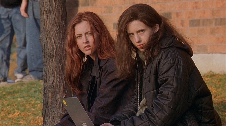 Two teen girls look suspicious in Ginger Snaps