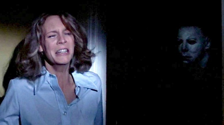 Laurie Strode hides from Michael Myers