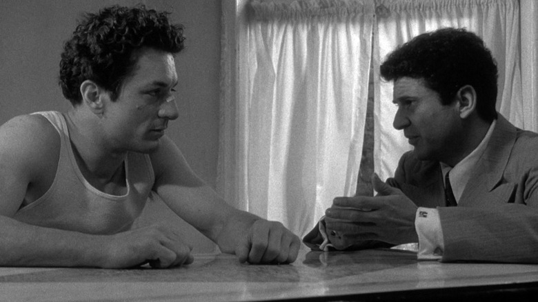 Jake and Joey talking at a table in Raging Bull