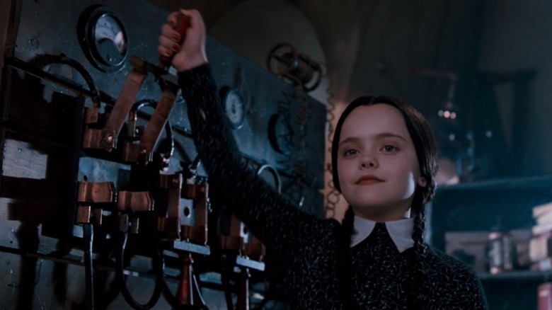 Wednesday Addams pulling lever