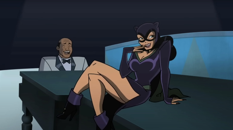 Catwooman sits on a piano in Batman The Brave and the Bold