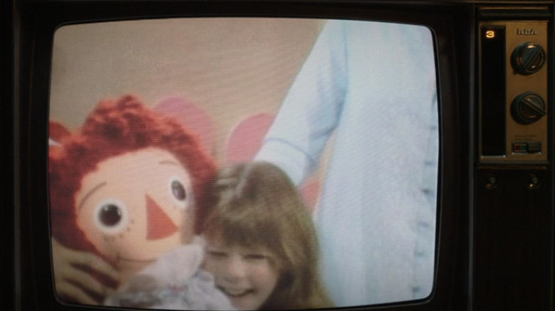 A child wins a Raggedy Ann doll on a gameshow in Annabelle Comes Home (2019)