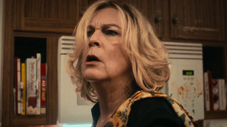 Jamie Lee Curtis as Donna Berzatto, preparing to scream in her kitchen in The Bear