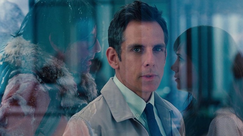 Ben Stiller as Walt fantasizes himself as a rugged ice climber speaking to Kristen Wiig as Cheryl in The Secret Life of Walter Mitty