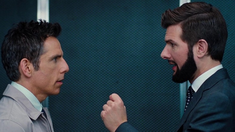 Adam Scott as Ted mocks Ben Stiller as Walter in an elevator in The Secret Life of Walter Mitty