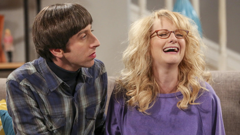 Howard and Bernadette with Bernadette crying on the couch on The Big Bang Theory