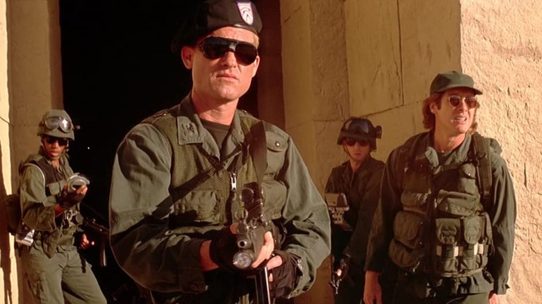 Kurt Russell leads a team of soldiers