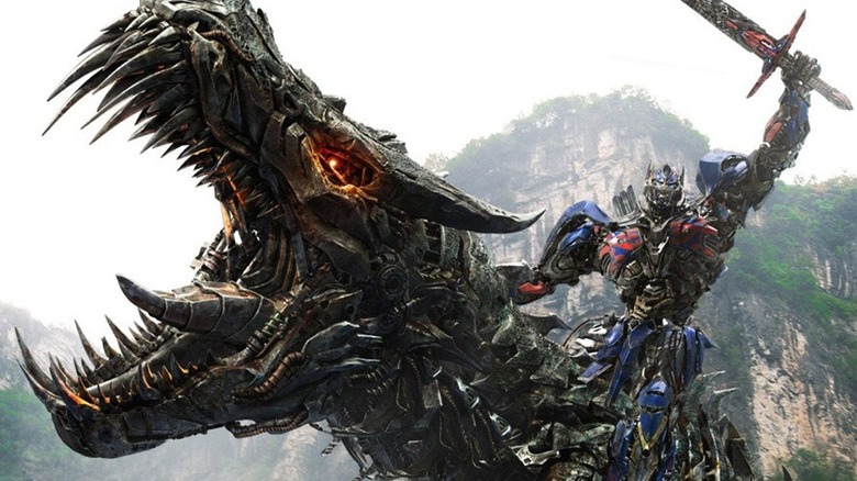 Optimus Prime rides Dinobot