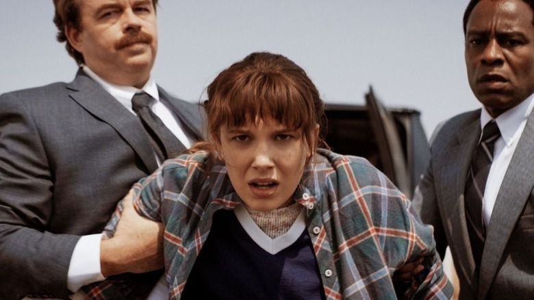 Millie Bobby Brown as Eleven in Stranger Things