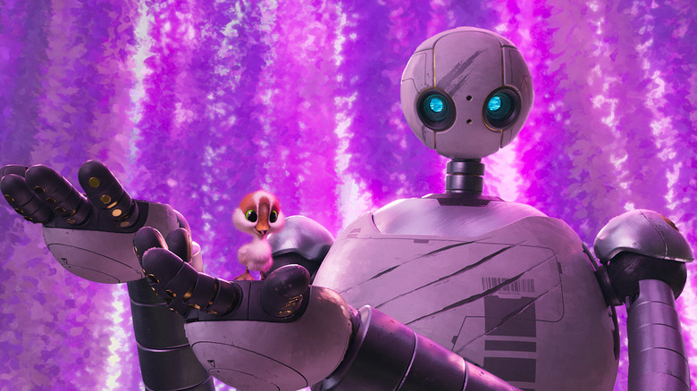 Roz holding Brightbill in The Wild Robot