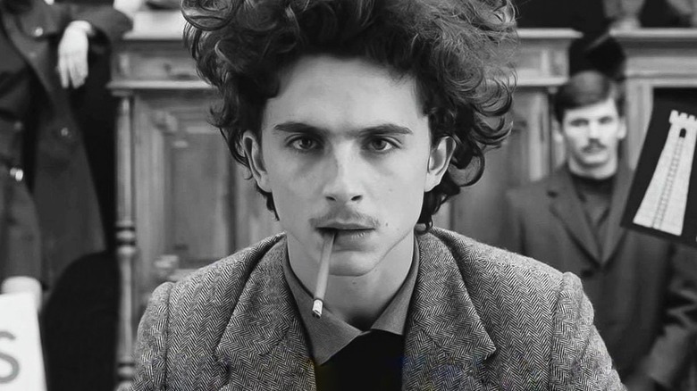 Timothee Chalamet smokes in "The French Dispatch"