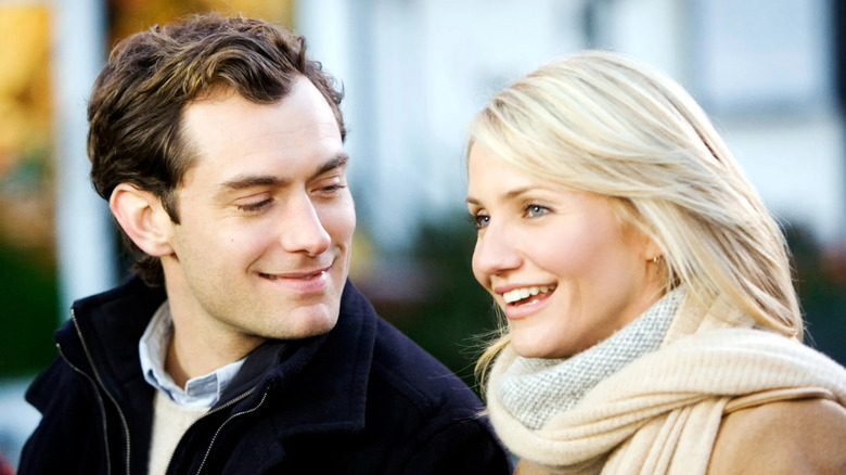 Graham and Amanda smiling at each other in The Holiday