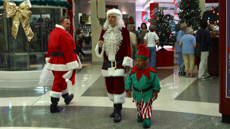 Billy Bob Thornton's Willie and Tony Cox's Marcus walking through the mall dressed as Santa and his elf in Bad Santa