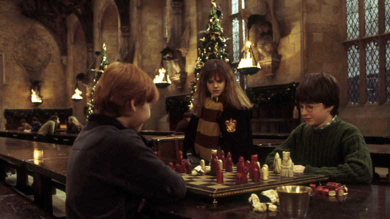 Ron and Harry playing chess in Great Hall