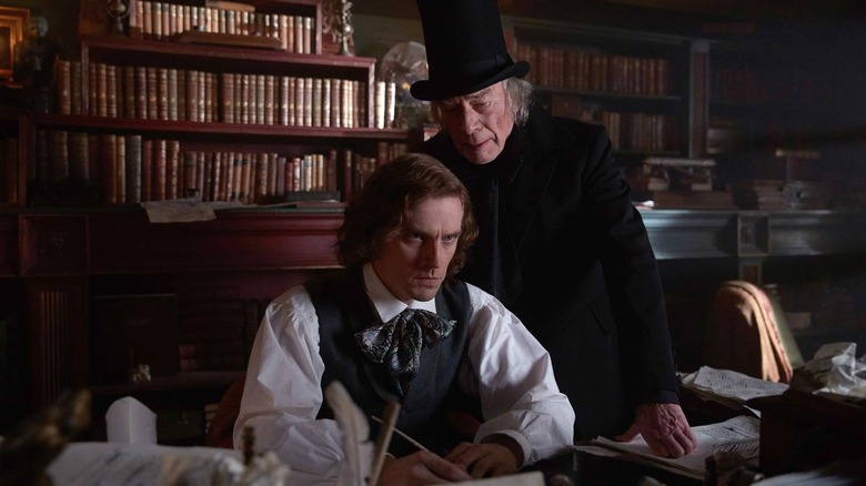 Scrooge talks to Charles Dickens