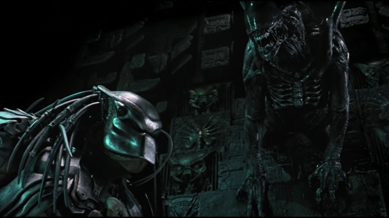 Xenomorph pouncing on Predator