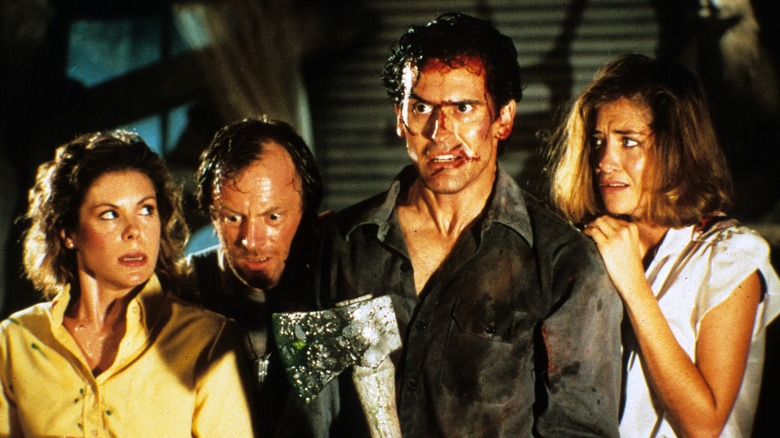 Bruce Campbell, Sarah Berry, Dan Hicks, and Kassie Wesley in "Evil Dead 2"