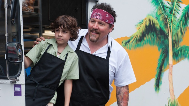 Jon Favreau and Emjay Anthony lean in "Chef"