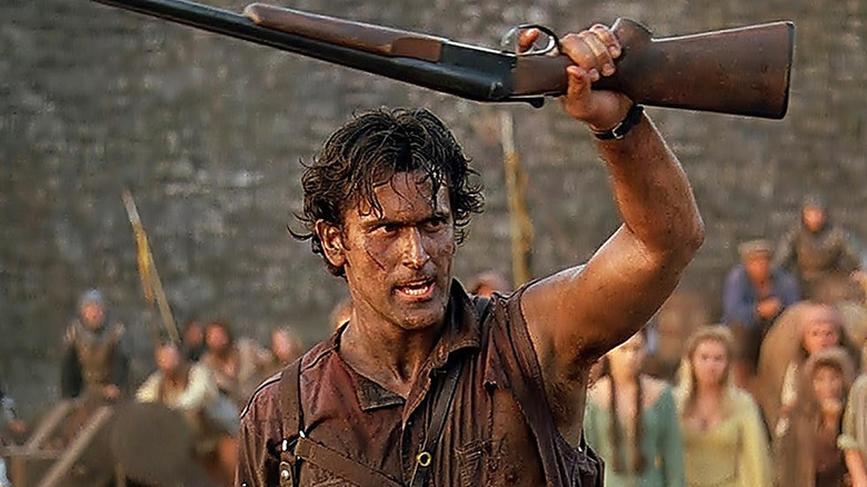 Ash Williams brandishing gun