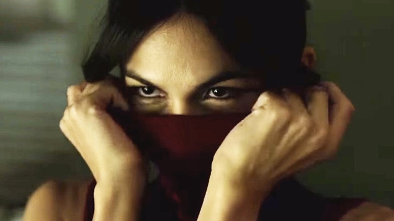 Elektra plays with her identity