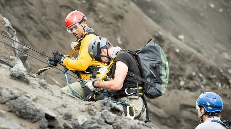 Will Smith climbs a mountain in Welcome to Earth