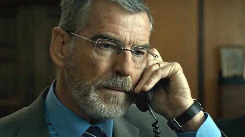 Pierce Brosnan on phone in The Foreigner