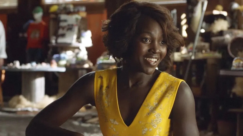 Lupita Nyong'o yellow dress Little Monsters