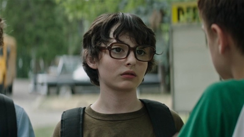 Finn Wolfhard with thick glasses