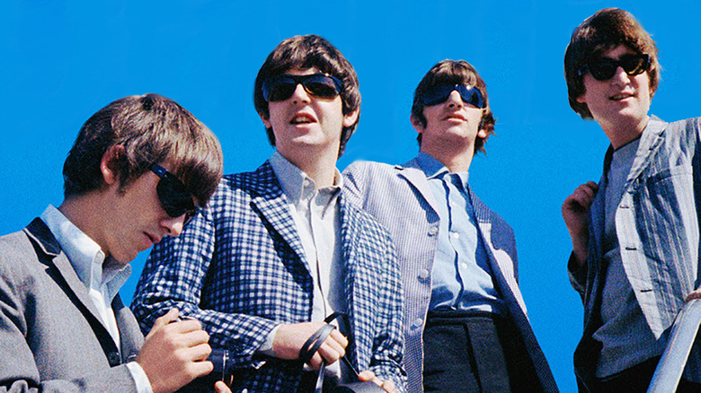 The Beatles blue backdrop