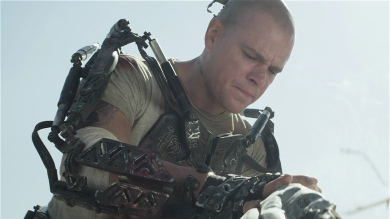 Matt Damon with robotic arm