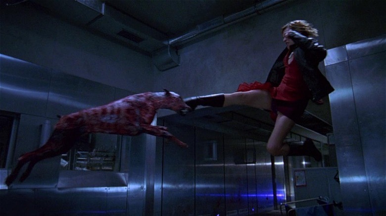 Milla Jovovich kicks zombie dog