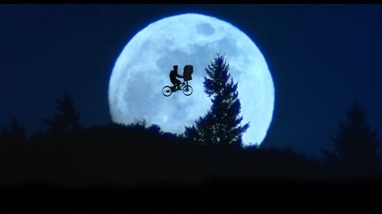 ET flying on bike with boy