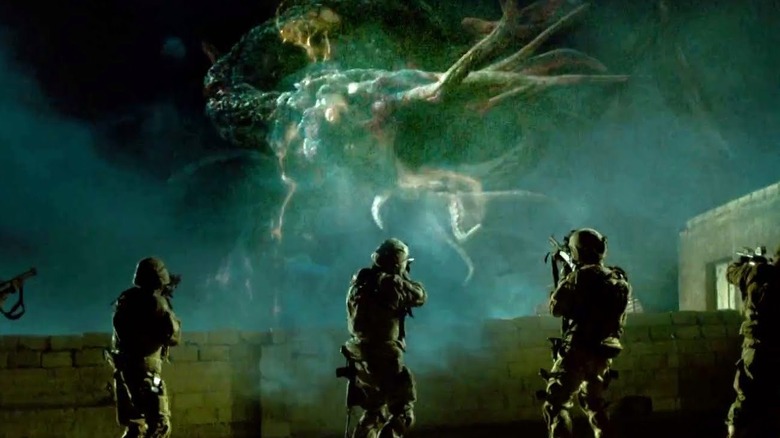 Soldiers fight alien monster