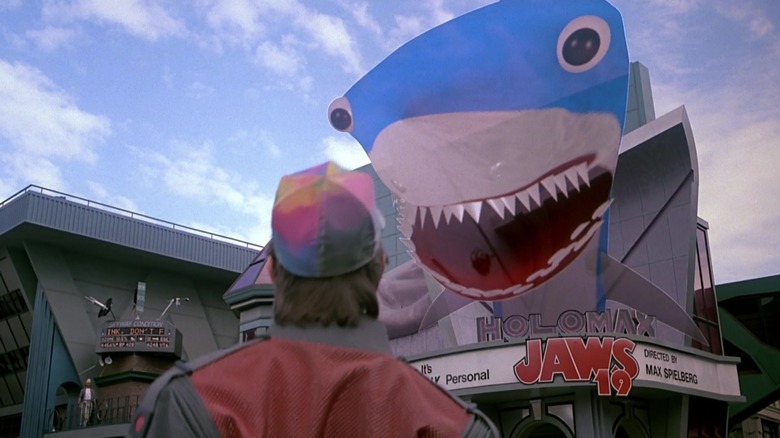 Marty McFly looking at a giant holographic shark, used to promote Jaws 19 in Back to the Future Part II